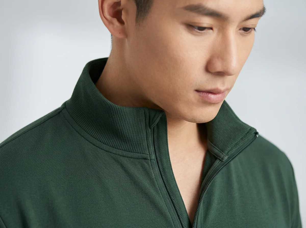 Ribbed collar and mock neckline detail with quarter zip